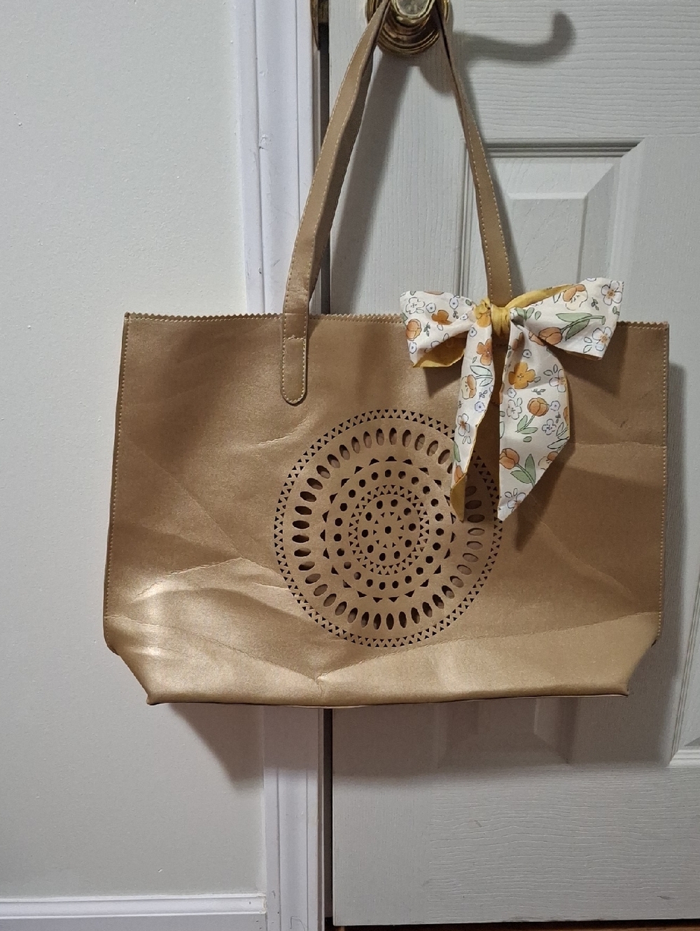 Neiman Marcus Metallic Gold Tote with Cutout Medallion and Floral Scarf Bow